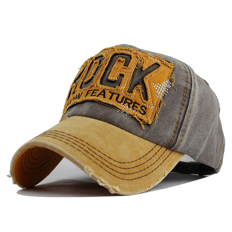 Stylish unisex baseball cap with rock embroidery, denim design, and mustard accents, perfect for sunny days.