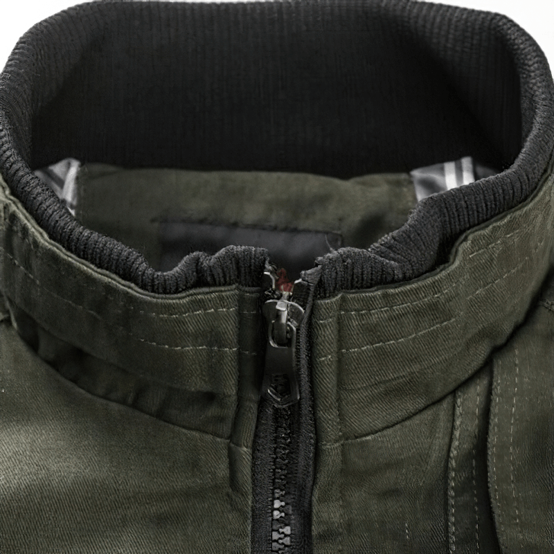 Close-up of the collar and zipper of a men's army cotton bomber jacket in military green.