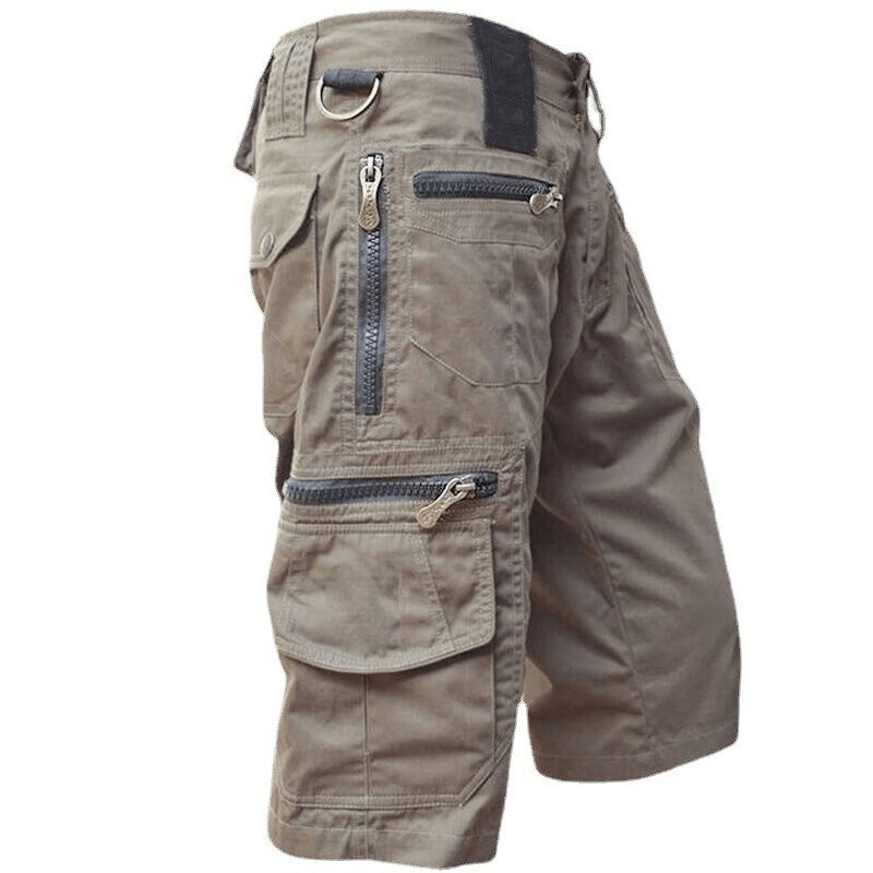Casual men's calf-length multi pocket military shorts in breathable fabric for stylish outdoor wear.