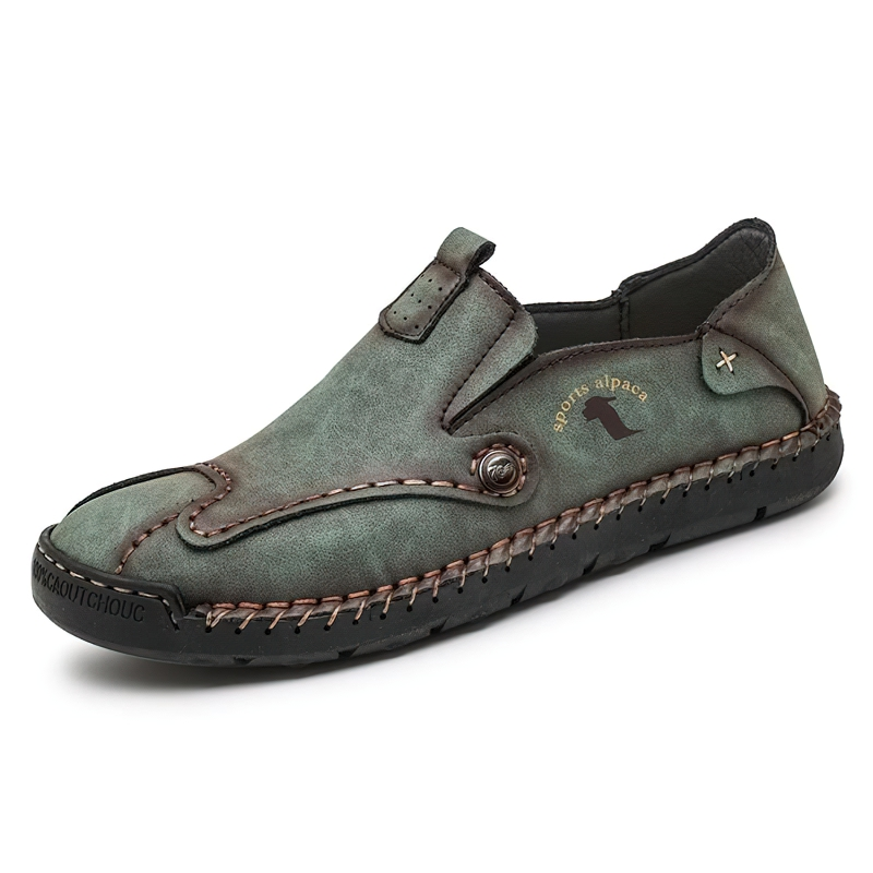 Stylish men's slip-on loafers in green PU leather with contrasting stitching and flexible sole for casual comfort.