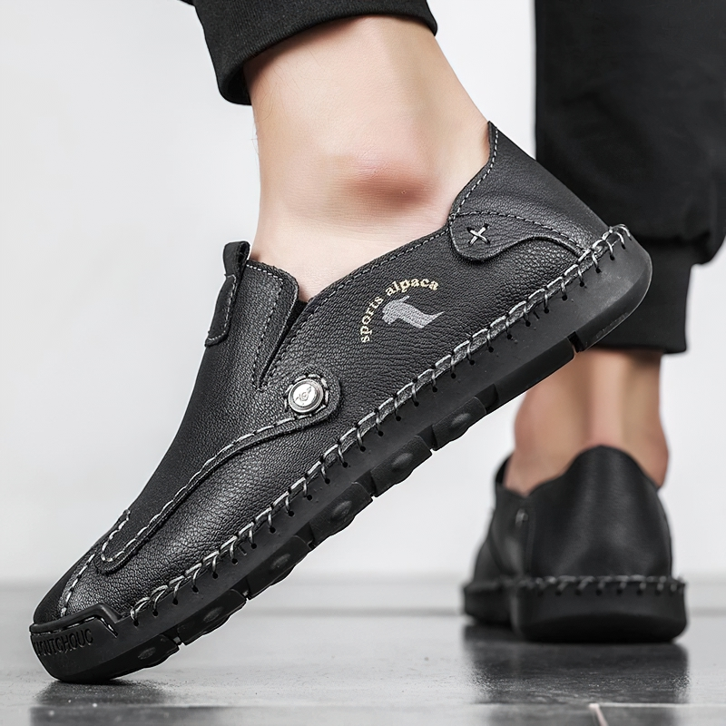 Stylish black PU leather loafers for men, featuring flexible soles for comfort and casual wear.