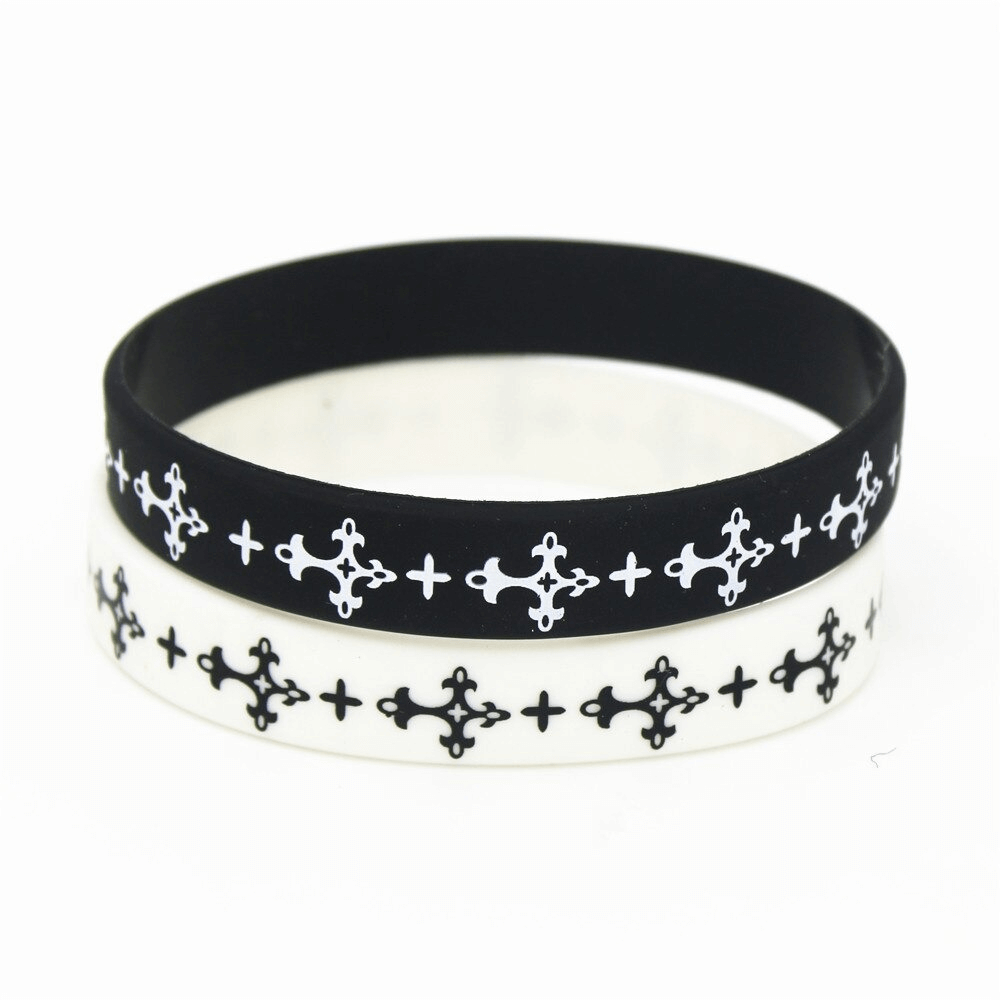 Black and white silicone wristband set with stylish cross pattern for sporty fashion accessories.