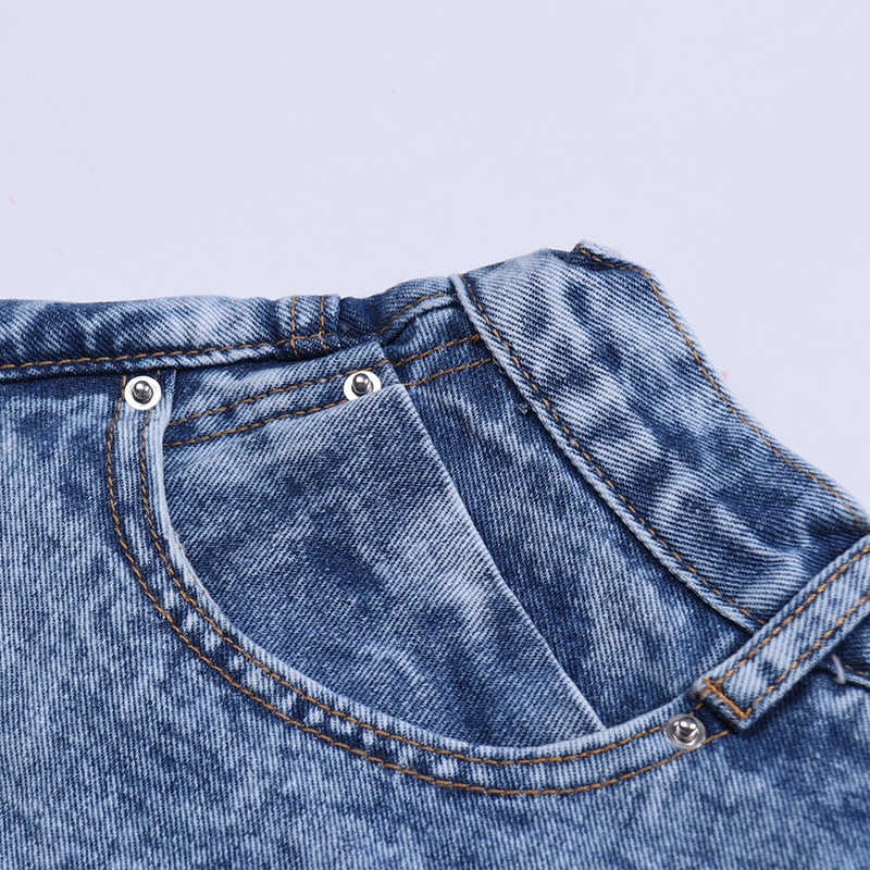 Close-up of casual denim shorts for women, showcasing the high waist and pocket detail, perfect for versatile summer outfits.
