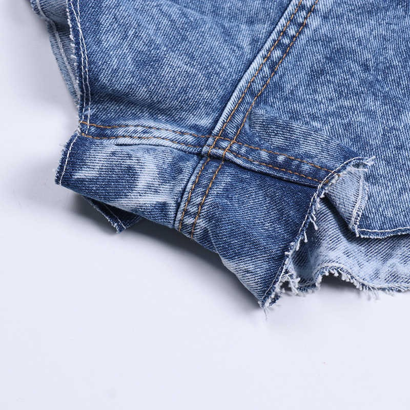 Close-up of casual women's denim shorts showcasing frayed hem and stitching detail in light blue fabric.
