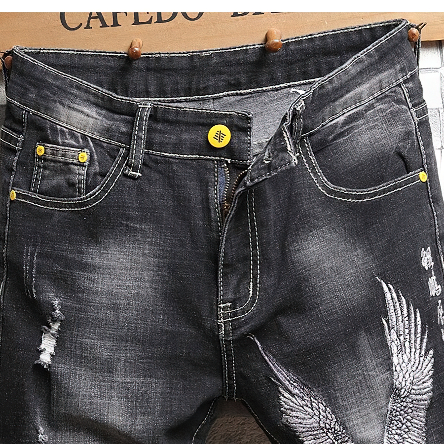Men's casual black denim shorts with eagle embroidery and yellow buttons, perfect for stylish summer outfits.