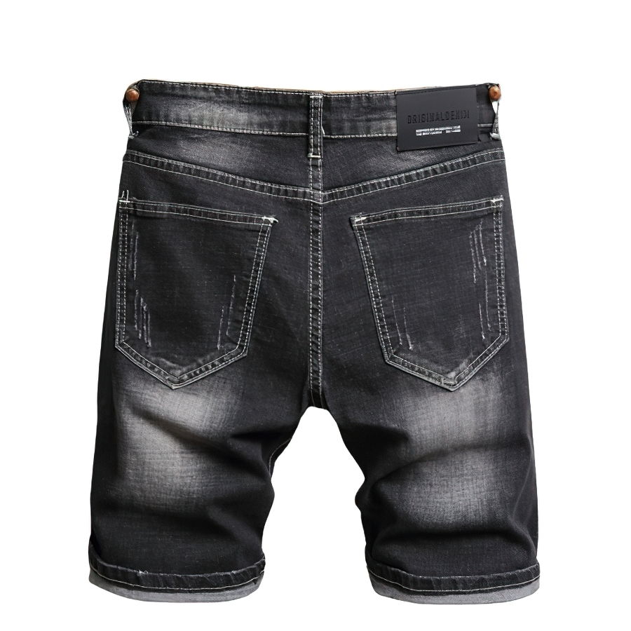 Men's black denim shorts with casual style, featuring a distressed look and back pockets for a trendy outfit.