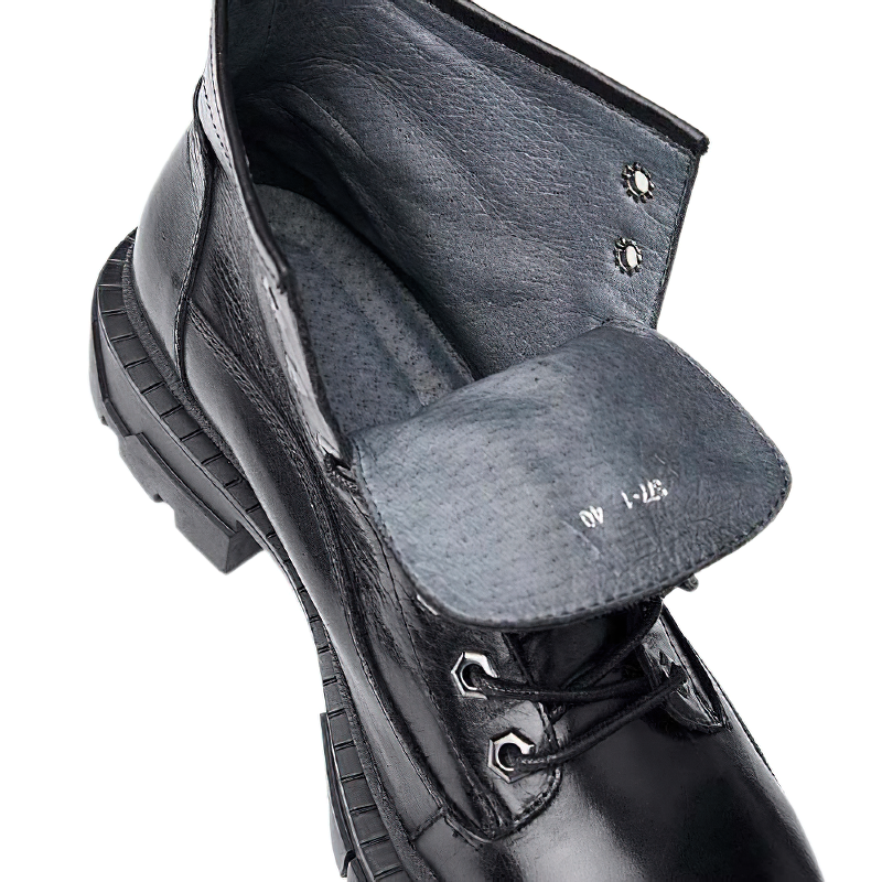 Close-up of men's casual high boots in genuine leather with a thick heel and stylish lace-up design.