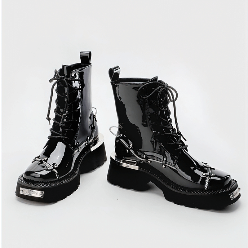 Casual lace-up glossy black Martin boots with square toe and stylish embellishments for women.