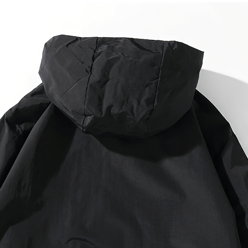 Casual loose black hoodie with a stylish hood, perfect for men's fashion and everyday wear.