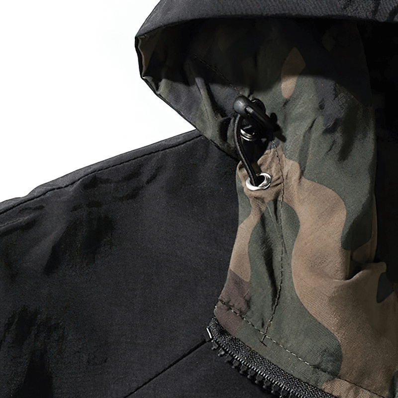 Close-up of a men's casual hoodie with a black exterior and camouflage lining, showcasing stylish hood design and adjustable elements.