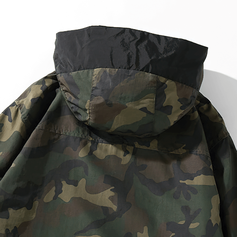 Back view of a stylish camouflage hoodie with a black hood, perfect for casual outdoor wear.