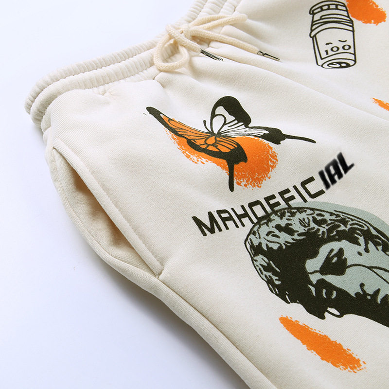 Casual loose pants for women featuring cool graffiti designs and an adjustable waistband for a comfortable fit.