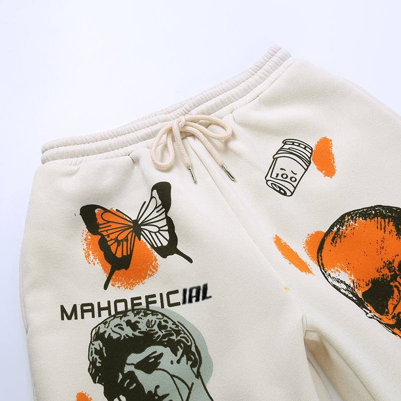 Casual loose women's pants featuring graffiti designs, butterflies, and a comfortable elastic waistband.