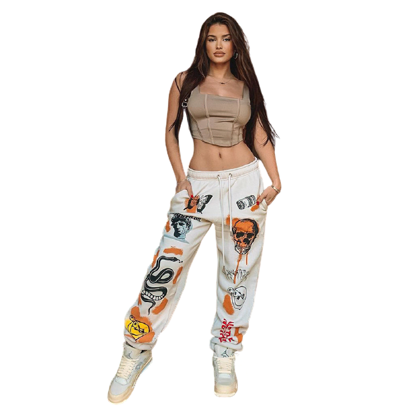 Casual loose pants for women with cool graffiti design, styled with a trendy crop top for a chic look.