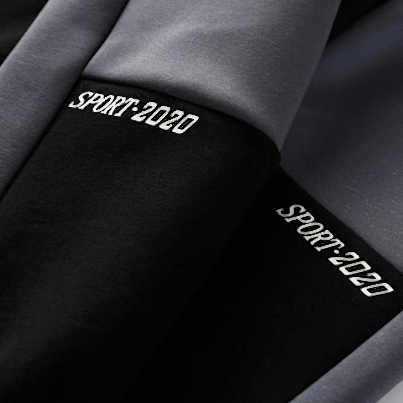 Close-up of a patchwork design on a casual men's sweatshirt featuring 'Sport:2020' embroidery.