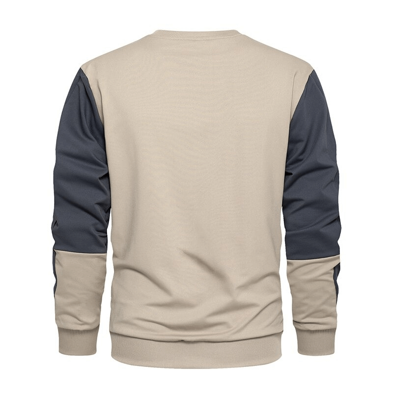 Back view of a casual men's O-neck patchwork sweatshirt in beige and navy blue, showcasing its loose fit and stylish design.