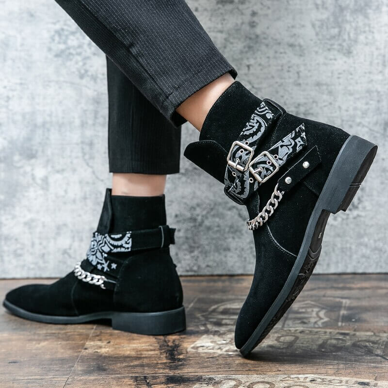 Stylish men's faux suede ankle boots with buckle strap and chain detail for a trendy casual look.