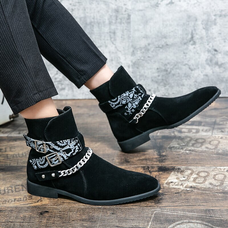 Stylish men's black faux suede ankle boots with decorative buckle strap and chain, perfect for casual wear.