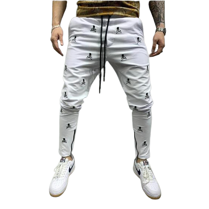 Casual men's lace-up pants featuring creative skull print, breathable material, and elastic waistband for comfort.