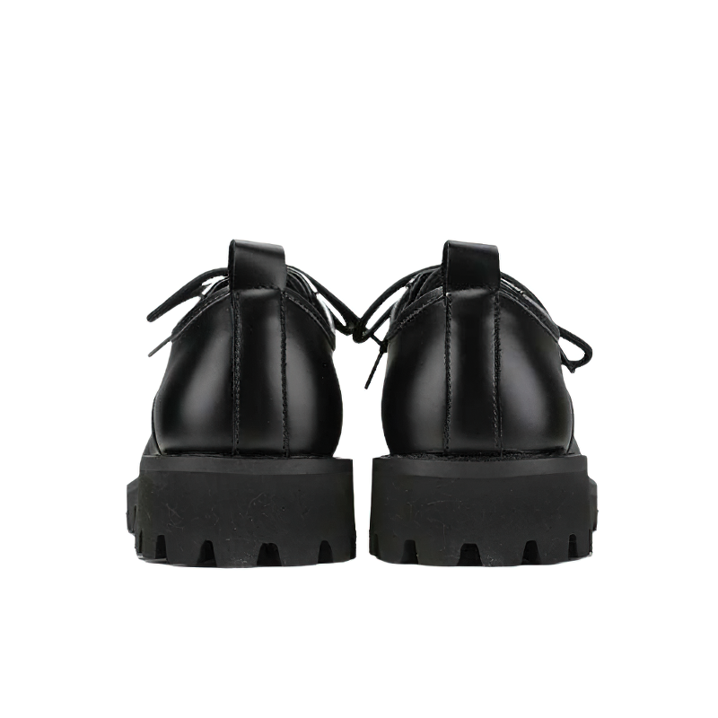 Casual men's real leather boots showcasing a stylish round back view, featuring a platform sole for extra height.