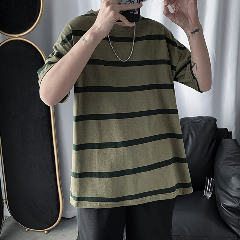 Men's oversized striped t-shirt in green and black, perfect for casual streetwear style.