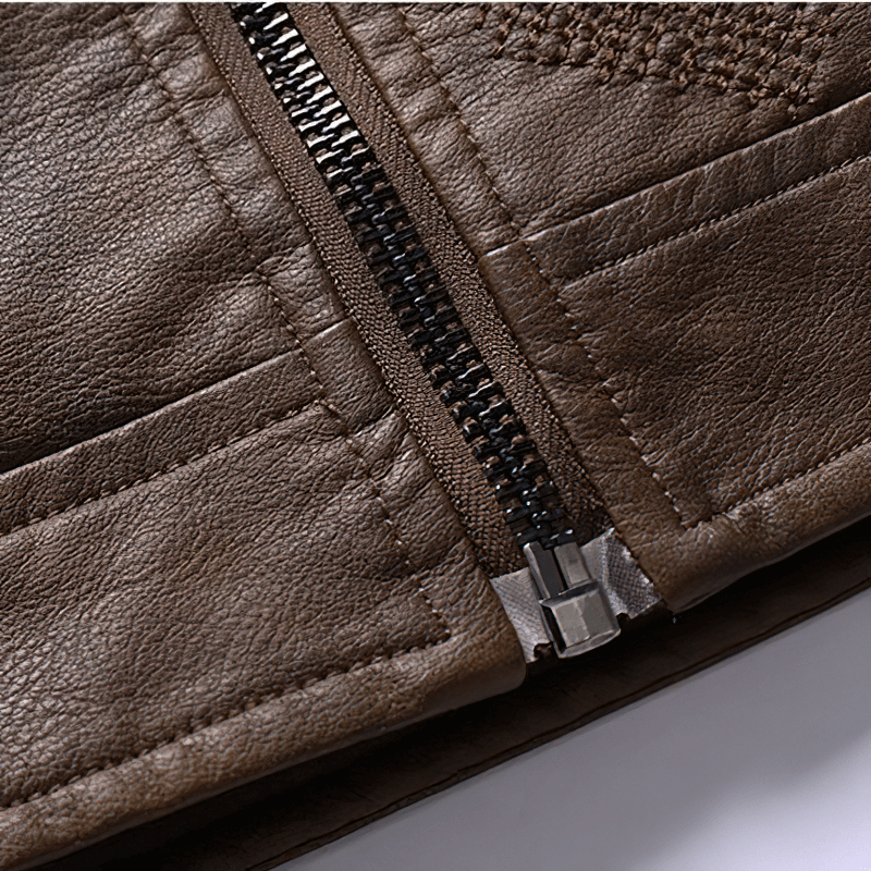 Close-up of casual motorcycle hooded jacket zipper and faux leather texture for men, showcasing quality craftsmanship.