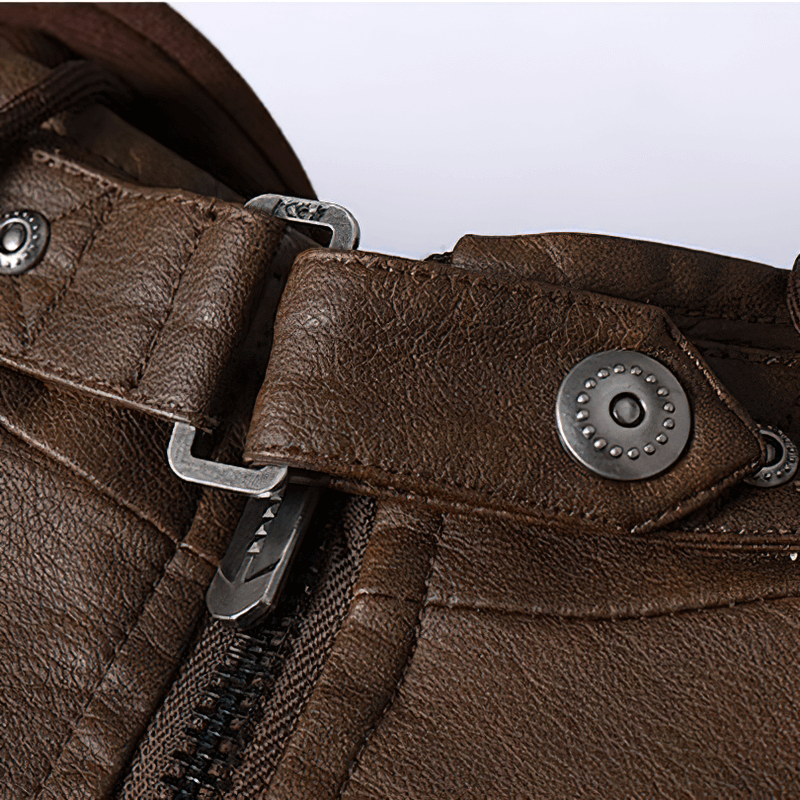 Close-up of the buckle and zipper detail on a casual motorcycle hooded jacket for men.