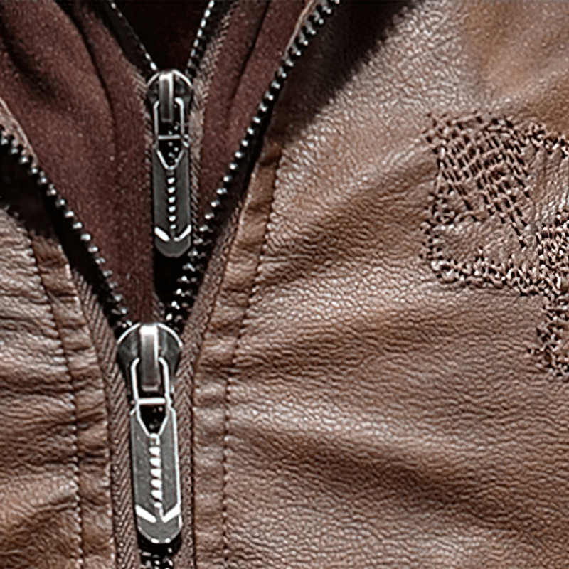 Close-up of casual men's motorcycle jacket featuring quality faux leather and stylish zippers.