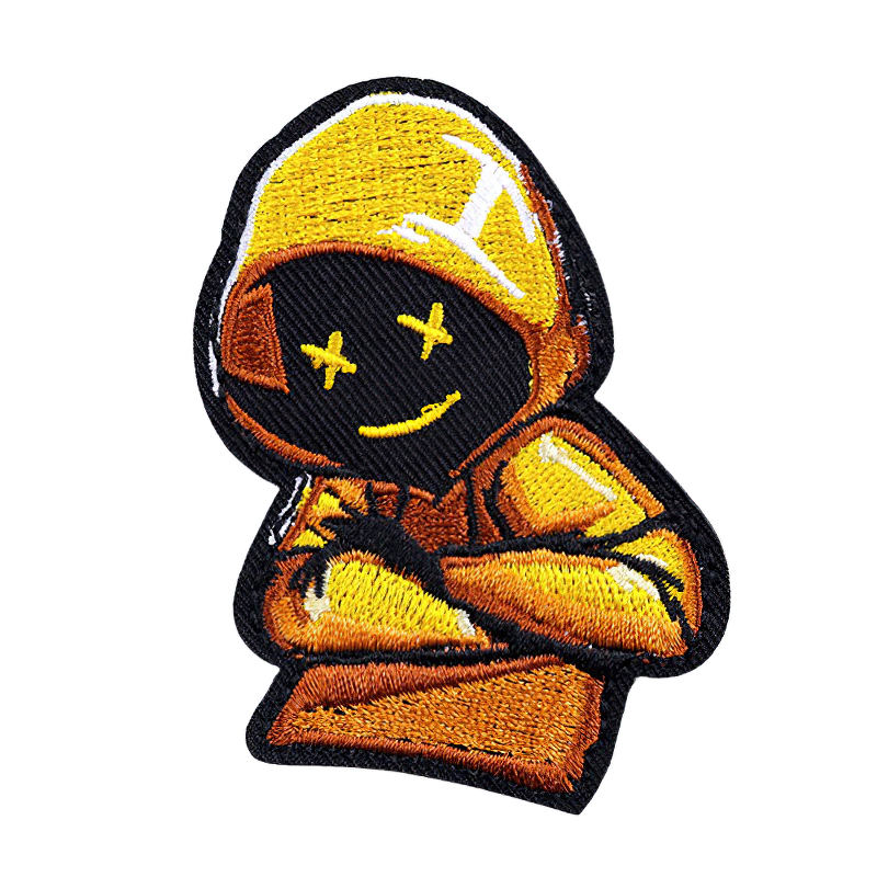 Unisex fashion patch of a boy in a yellow hoodie, trendy accessory for clothing decoration.
