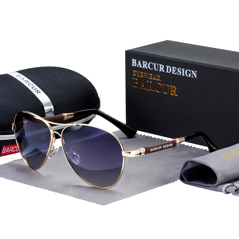 Stylish polarized gradient sunglasses for men and women by Barcur, showcasing a chic design in a black and gold aesthetic.