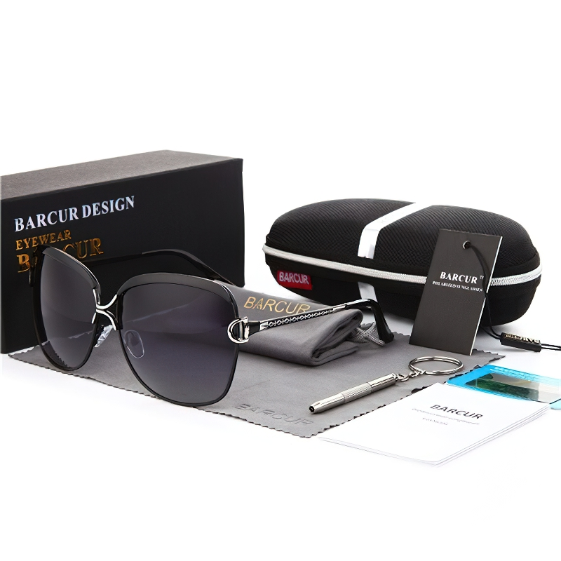 Stylish polarized women's sunglasses with round gradient lens, case, cleaning cloth, and accessories from Barcur Design.