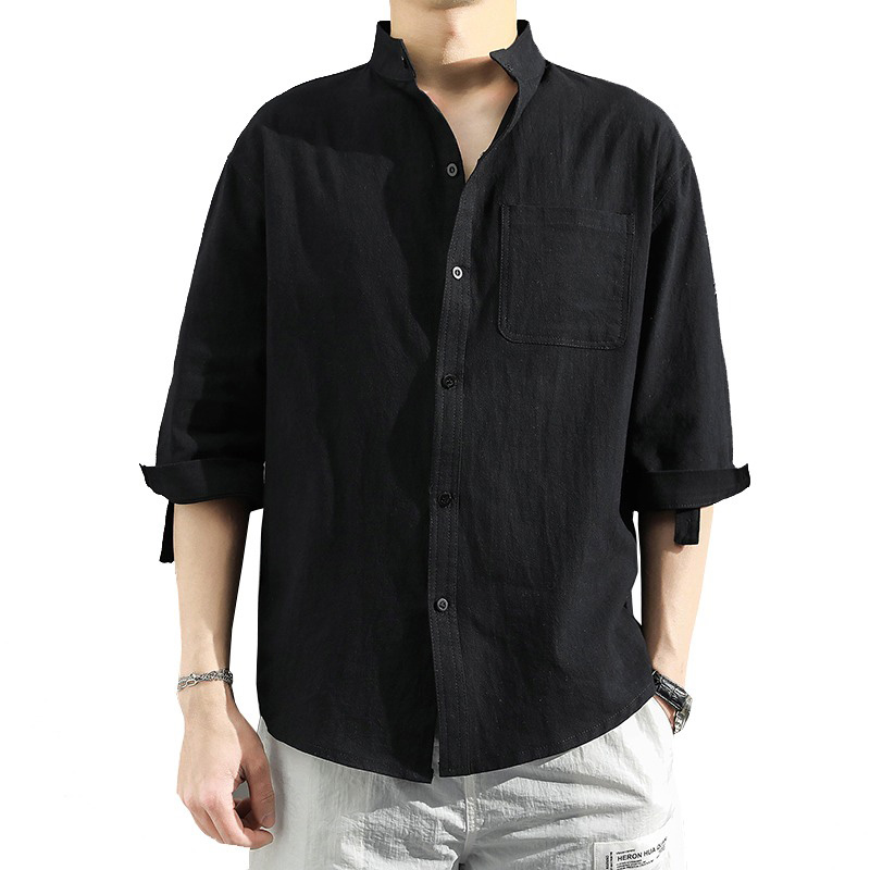 Casual slim fit men's black long sleeve shirt with single breasted style and pocket, perfect for laid-back outfits.