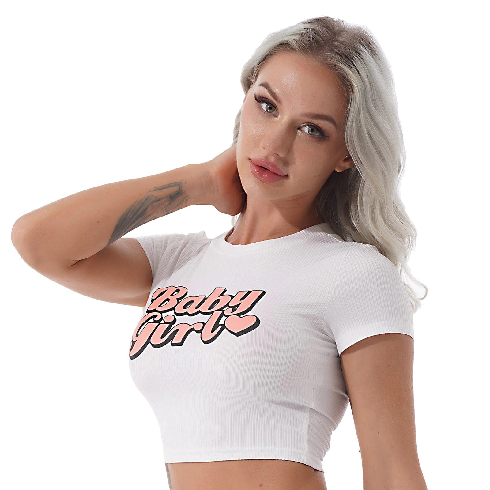 Stylish female model showcasing a casual white cropped t-shirt with 'Baby Girl' print, perfect for summer outfits.