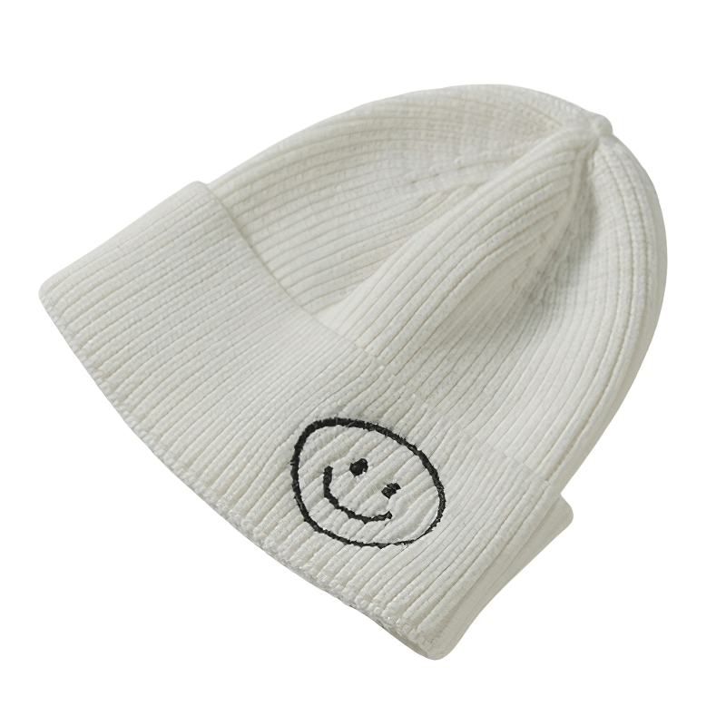 Casual unisex knitted hat in white with smile print, perfect for warmth and a stylish accessory.