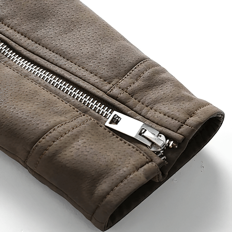 Close-up of a zipper detail on a men's soft faux leather jacket sleeve.