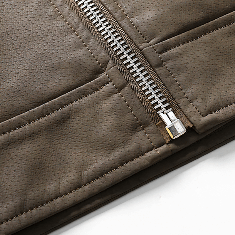 Close-up of the zipper detail on a soft faux leather fleece jacket, showcasing stylish texture and quality craftsmanship.