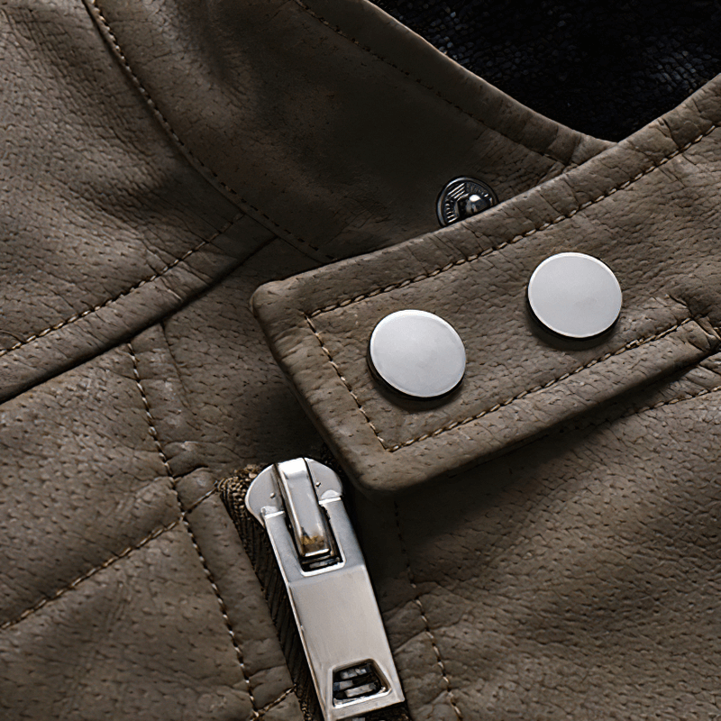 Close-up of the stand collar and zipper detail on a stylish men's faux leather jacket.