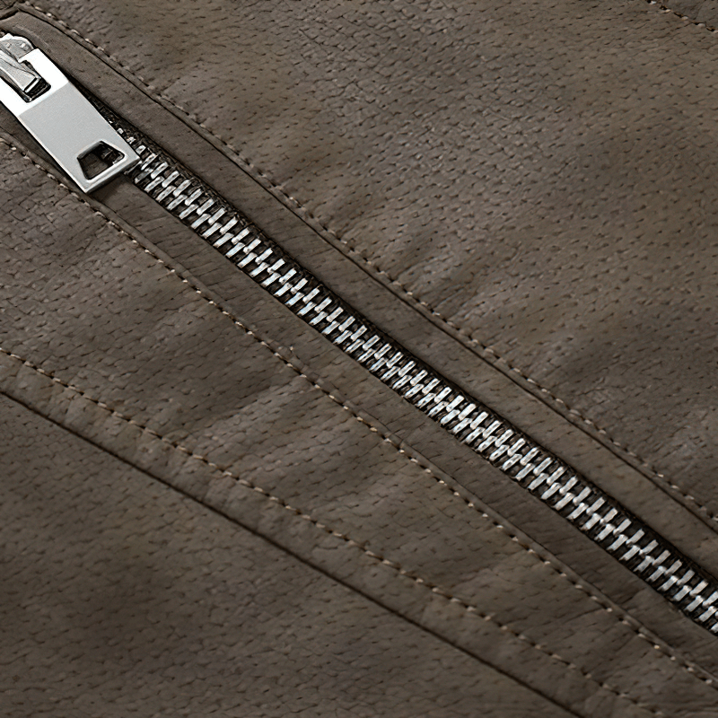 Close-up of a stylish brown faux leather zipper on a men's casual jacket, showcasing quality and detail.