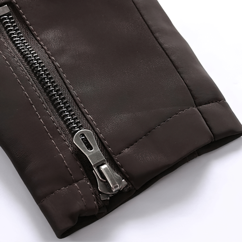 Close-up of a zipper detail on a men's dark brown PU leather motorcycle jacket sleeve.