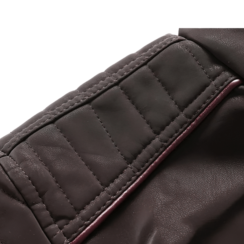 Close-up of the quilted sleeve detail on a men's PU leather motorcycle jacket.