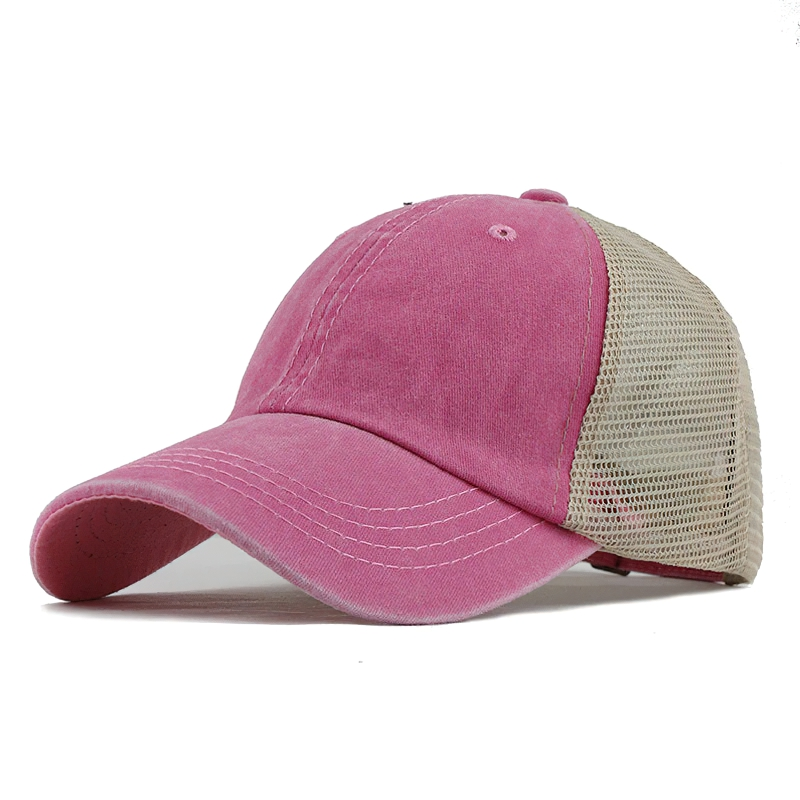 Stylish pink unisex baseball cap with mesh back, perfect for casual outfits and sunny days.