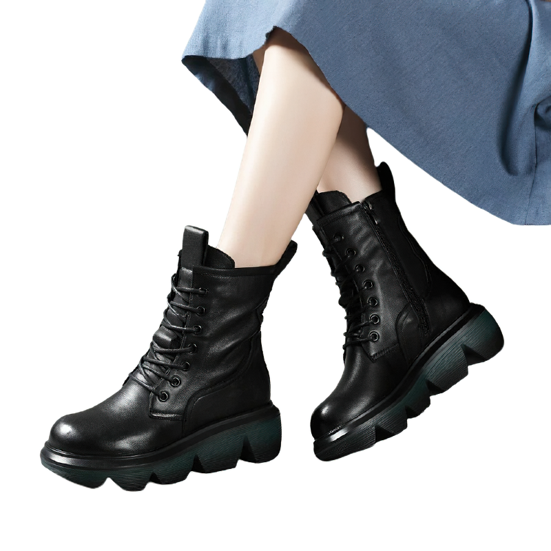 Casual women's stylish black leather boots with thick soles, perfect for comfort and everyday wear.