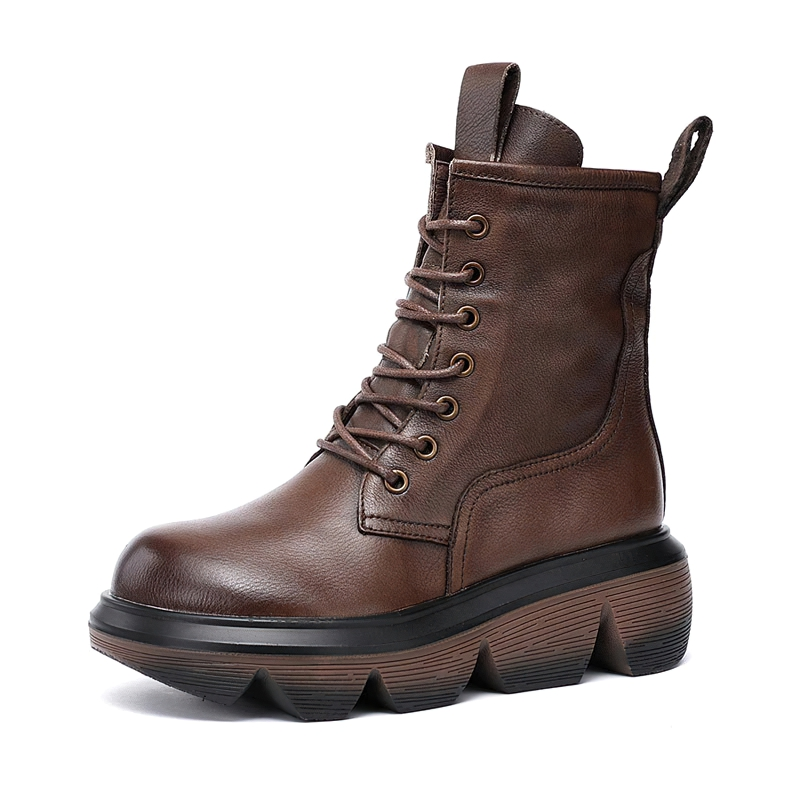 Stylish brown women's casual boots made of genuine leather with thick rubber sole and lace-up design.