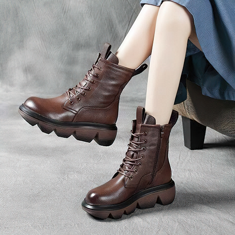 Stylish women's brown genuine leather boots with thick soles, perfect for casual wear and comfort.