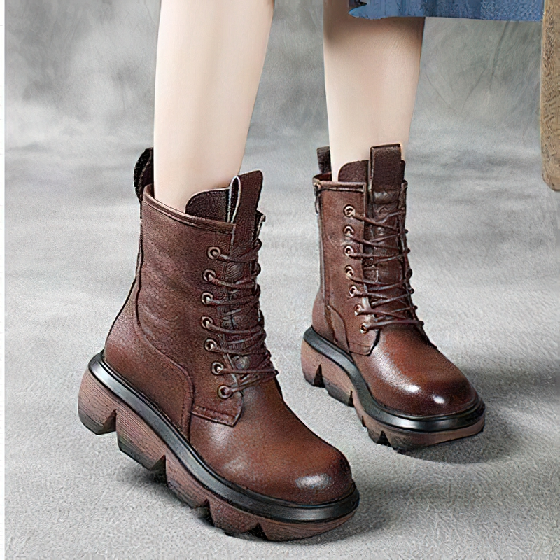 Stylish brown genuine leather boots for women with thick soles, perfect for casual wear and comfort.