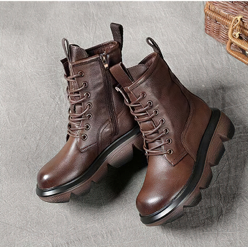 Stylish brown women's casual boots made of genuine leather with thick rubber soles for comfort and support.