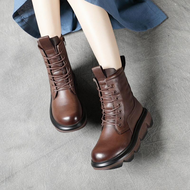 Stylish brown leather women's boots with thick soles and laces, perfect for casual outfits and comfort.