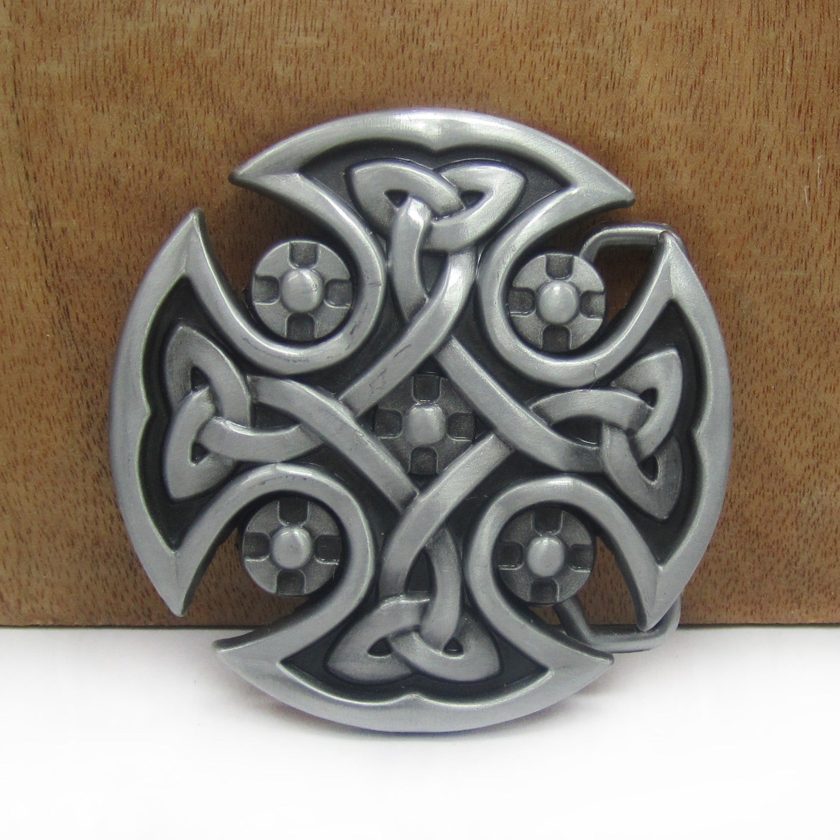 Celtic cross belt buckle in antique silver, decorative round accessory for cosplay and fashion.