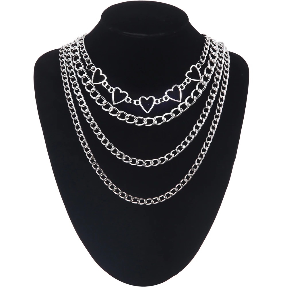 Layered heart chain necklace for women showcasing trendy fashion and aesthetic style, perfect for any outfit.
