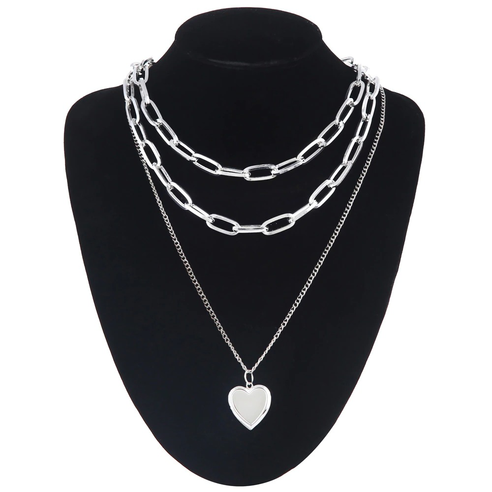 Trendy layered chain necklace with heart charm for women, perfect for adding style to any outfit.